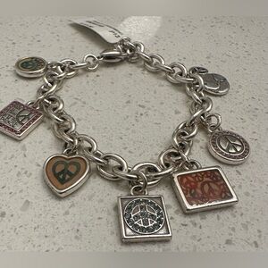 Silver Charm Bracelet with Peace Symbols